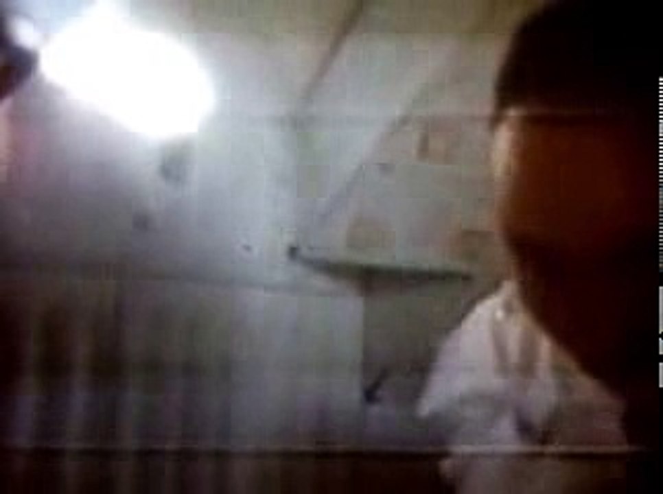 Aboard the Apollo 11 Command Module, Michael Collins shows where he sleeps