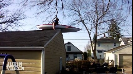 Crazy guy jump from roof with boat