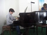 Sam plays Liszt Consolation 4  concert 15 March, 2009.AVI