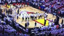 Miami Heat Dwyane Wade shooting hoops during his country's national anthem