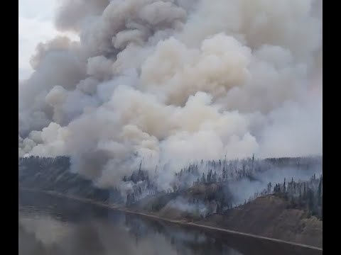 Firefighters Battle McMurray Fire by Helicopters
