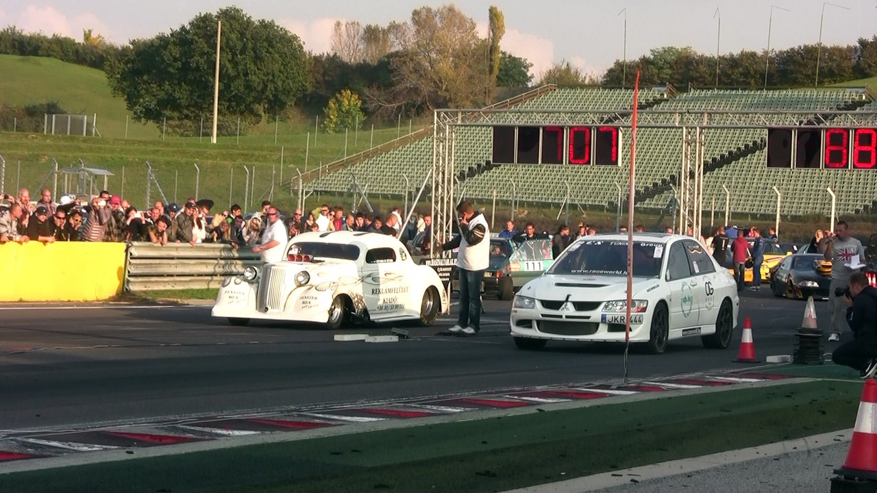 Chevrolet Coupe Vs. Mitsubishi Lancer EVO VII
