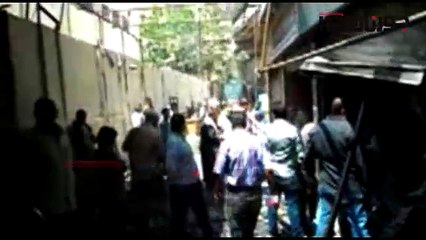 أهالى الغورية يساعدون فى رفع أنقاض الحريق