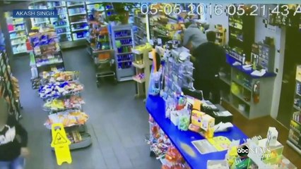 Braqueur VS caissière pas commode. Bim! A coup d'extincteur