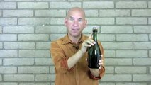 Opening a bottle of sparkling wine with a flute