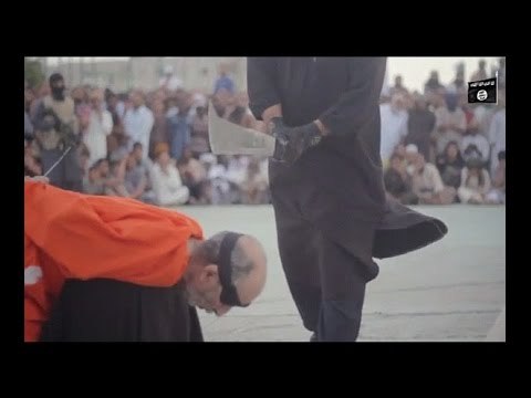 ISIS releases new video_ Terrorists behead two 'magicians' publicly