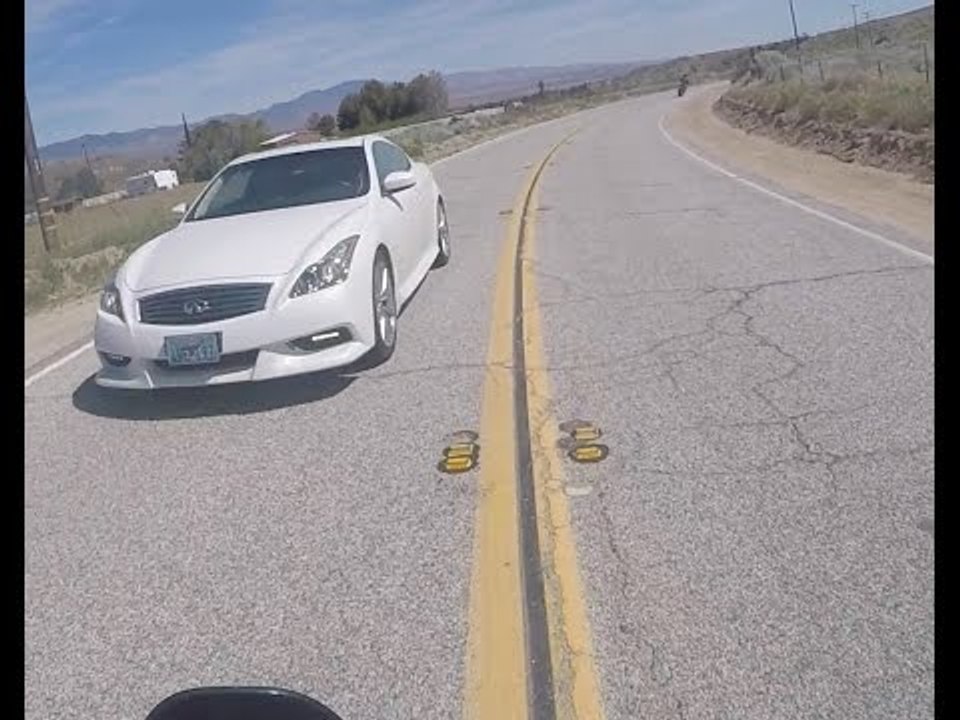 Motorcyclist in Shock After Close Call With Oncoming Car