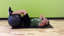 How To Do The Crunch - Legs on Exercise Ball - Fitness Training For Males - FxFitness.ca