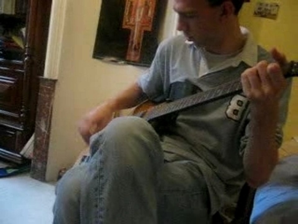 sam à la guitare electrique