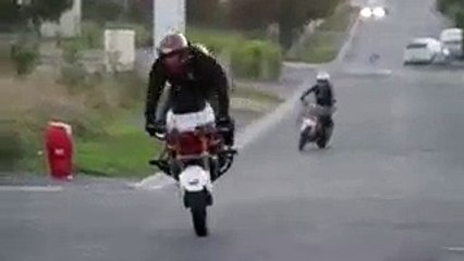 Awesome heavy bike stunt on road: