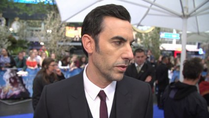 Sacha Baron Cohen Is Outrageous At 'Alice Through The Looking Glass' Premiere