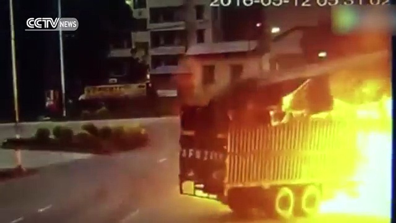 Two trucks collide and burst into flames