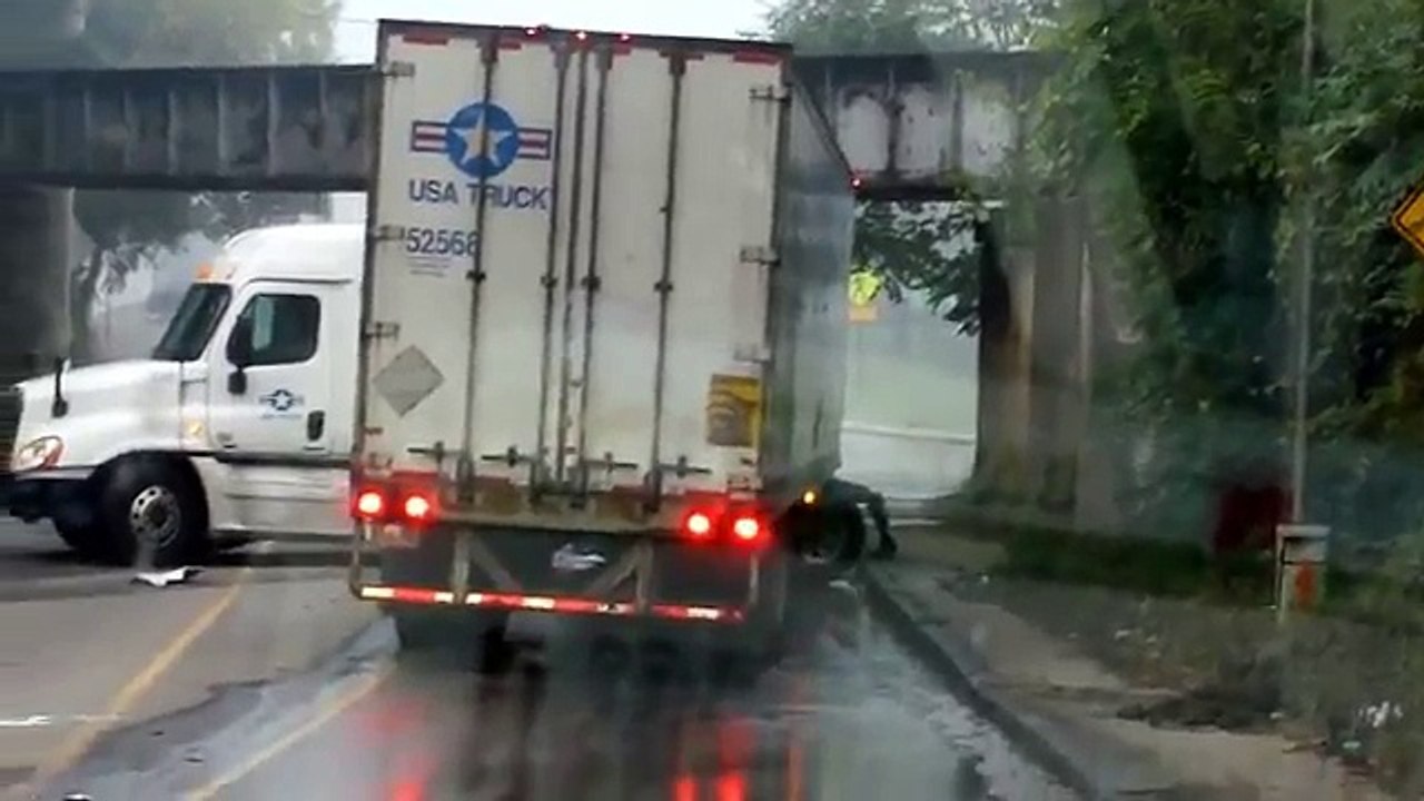 Driver Fails at Low Bridge U-Turn