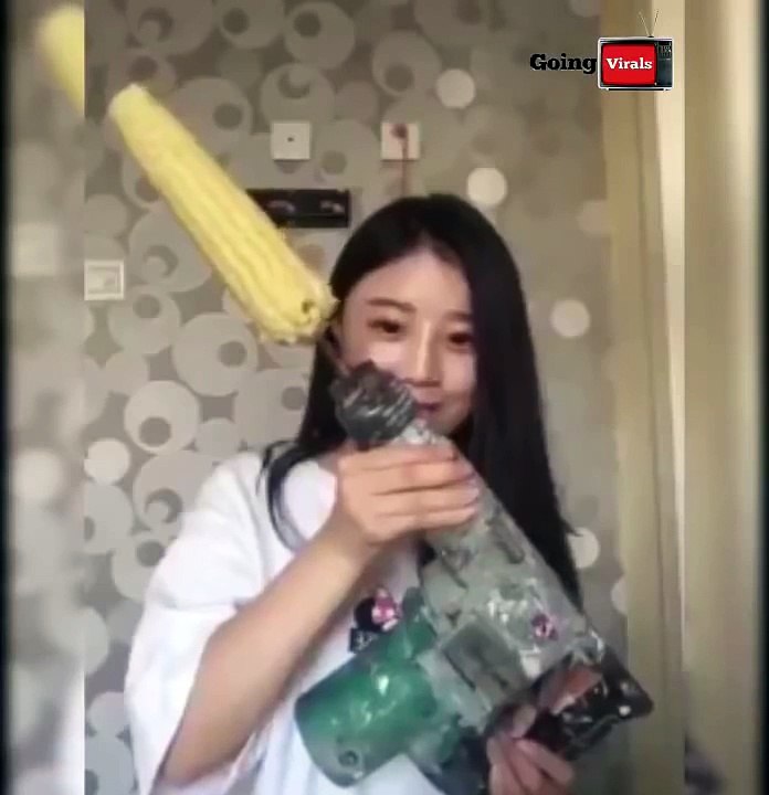 Asian Girl Eating Corn In Machine Drill Gone Wrong