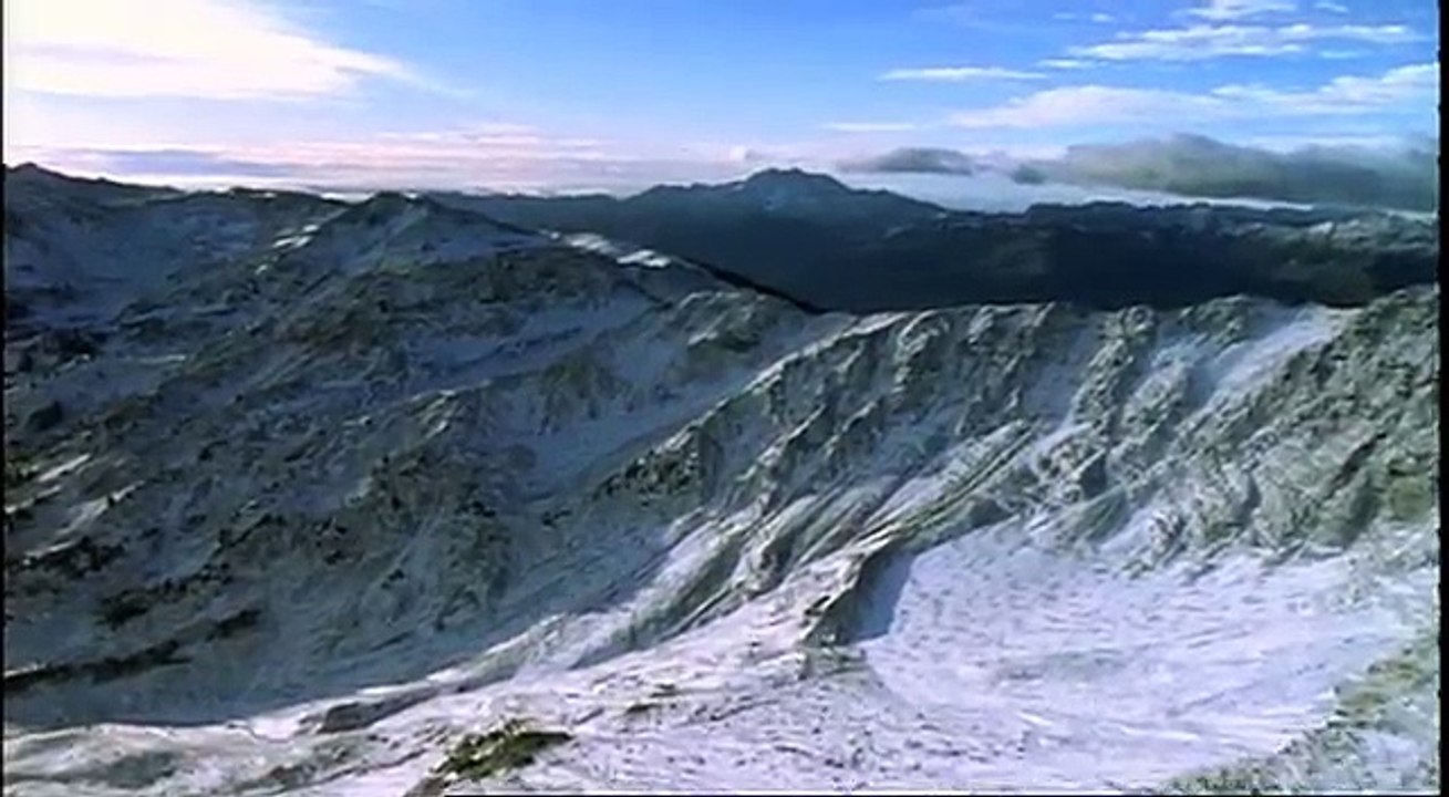 FlyingoverSnowCoveredMountains