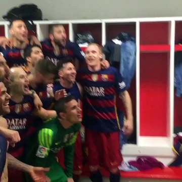 FC Barcelona players celebrating their league win in the locker room