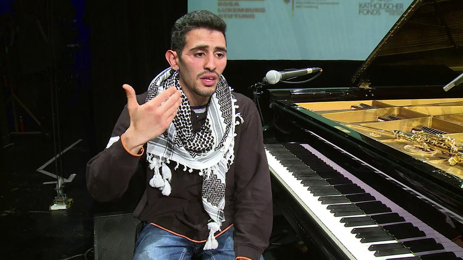 Palestinian-Syrian pianist sings about the war he escaped