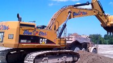 Cat excavator big loads