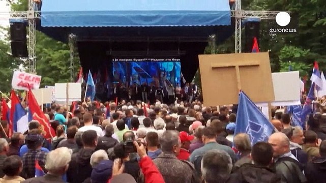 Divided Bosnian Serbs protest for and against the government