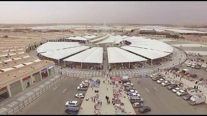 تصوير جوي يظهر جمال الإضاءة الليلية لـ"حراج ابن قاسم" بالریاض