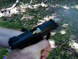 High-Speed Close Up Shooting the Ruger SR-22 Pistol