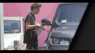 Louis Tomlinson goes wardrobe shopping before America's Got Talent appearance