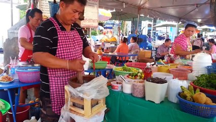 Preparing somtam or papaya salad Chatuchak Weekend Market, Bangkok Thailand