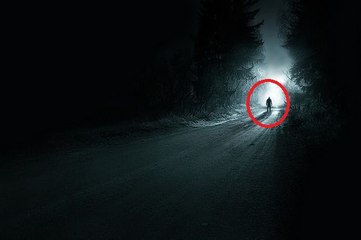 Creepy Footage Captures Shadowy Figure Crossing the Street