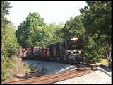 NS Savannah and Atlanta Heritage SD70ACe #1065 leads NS #336 at Camp Hill, Alabama - 5/27/13