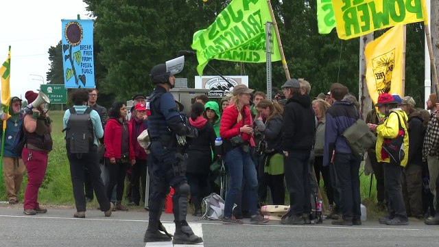 Environmental activists attempt to 'close down' oil refineries