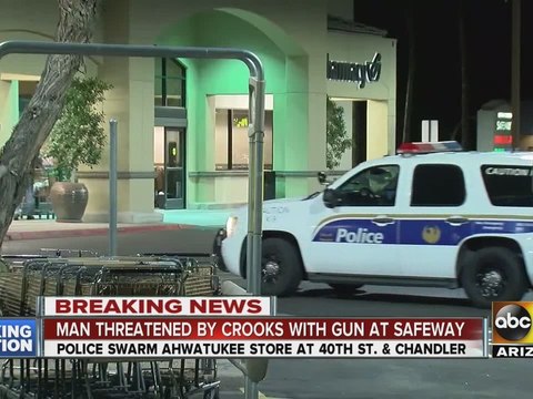 Police searching for grocery store robbery suspects