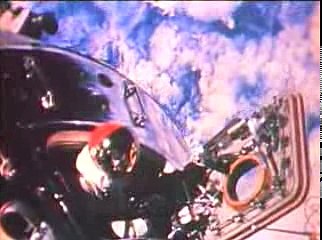 A view of the Apollo 9 Command Module from space with its hatch open.