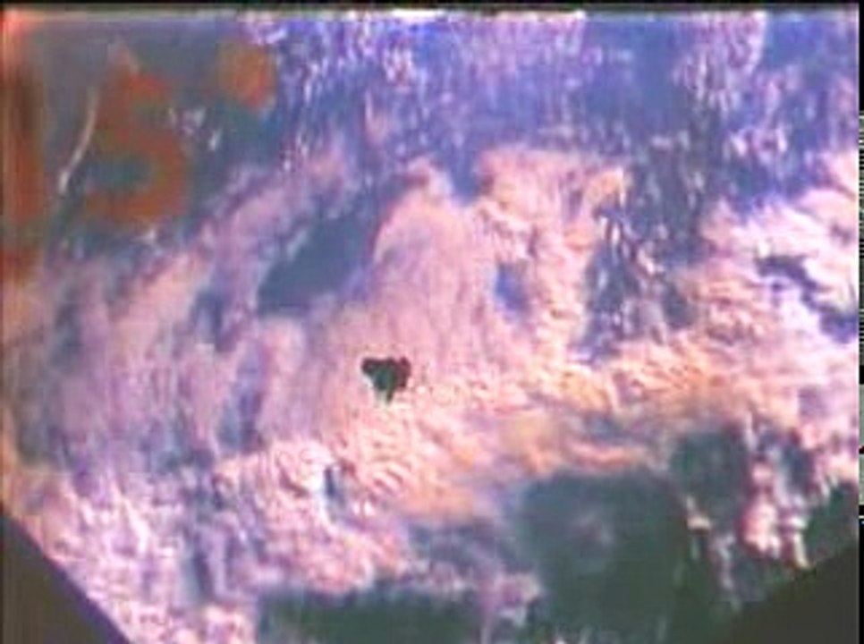 The Apollo 9 Command Module 'Gumdrop' approaches the Lunar Module 'Spider.'