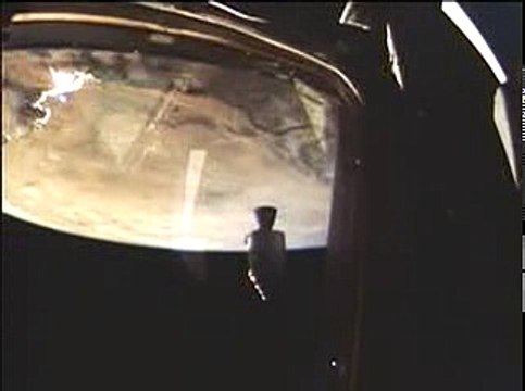 The Apollo 9 Command Module 'Gumdrop' as seen from the Lunar Module 'Spider'.