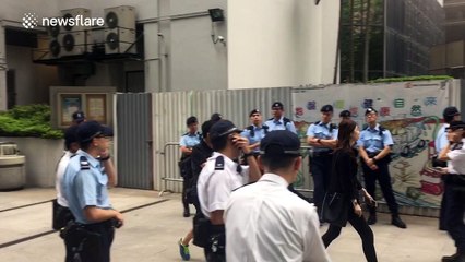 Heavy police presence as key Chinese leader visits Hong Kong
