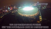 Beautiful view of stadium lights at night, city aerial, panorama. Stock Footage