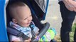 Giggling baby thinks skateboard crash is hilarious