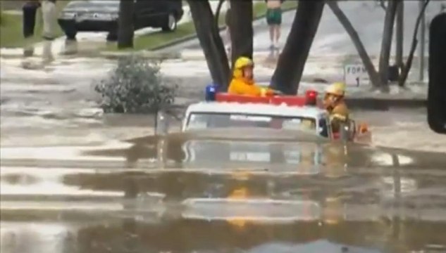Fire truck drives through 11ft flood