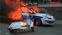 Paris: une voiture de police incendiée par des contre-manifestants