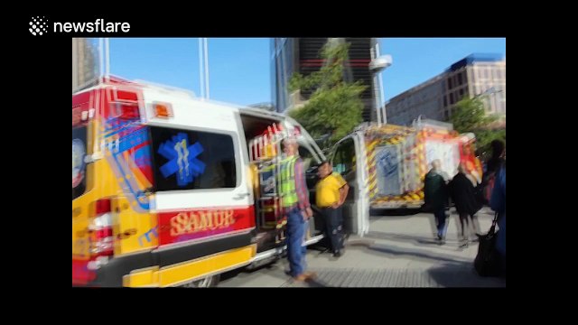 Greenpeace activists climb Madrid tower to protest TTIP