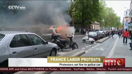 France labor protestors set fire to police car
