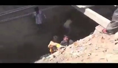 OMG!!!  Indian Lady MP falls into 8ft deep sewer during TV interview - Video Dailymotion