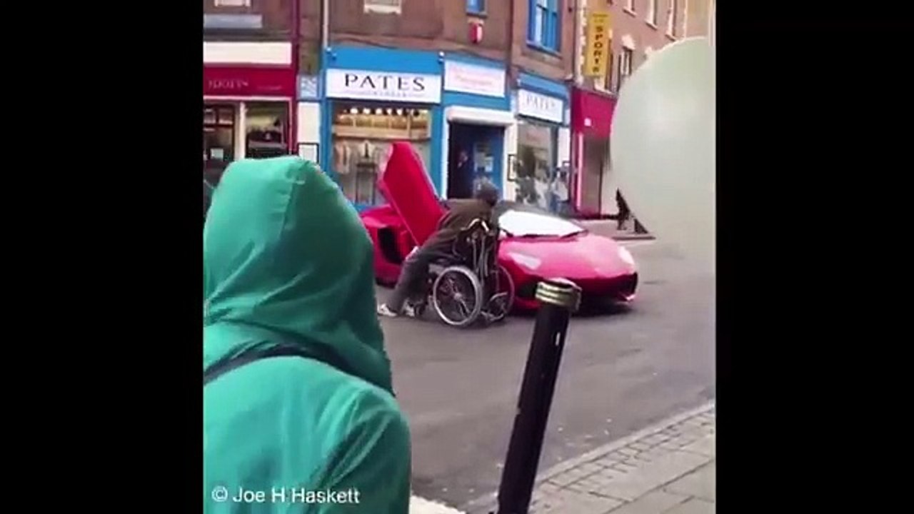 Lamborghini driver is taunted by man in a wheelchair