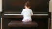 Lily, 28 months, playing piano