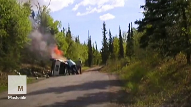 Dashcam shows heroes saving a man trapped under his burning SUV