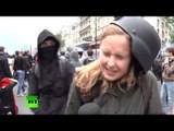 France : anti-labor protester wacks RT reporter upside head during the live report