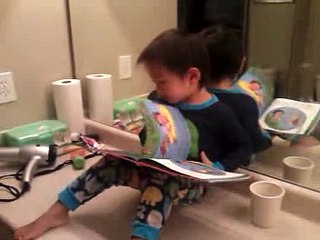Grace 34 months reads her dora book