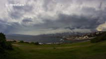 Amazing footage of storm clouds rolling across a beach in Sydney, Australia