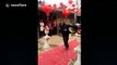 Man shows off enthusiastic dance at wedding ceremony