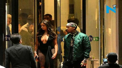 Pics: Tyga's new girl was recruited by 'black Hugh Hefner' as his 'escort'